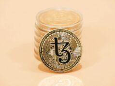 Как безопасно совершать криптовалютные транзакции a stack of coins sitting on top of a table