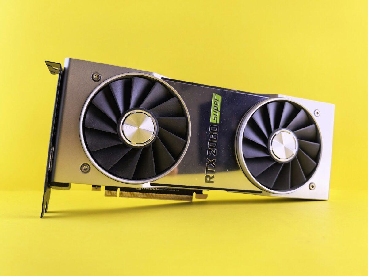 A close up of a video card on a yellow background