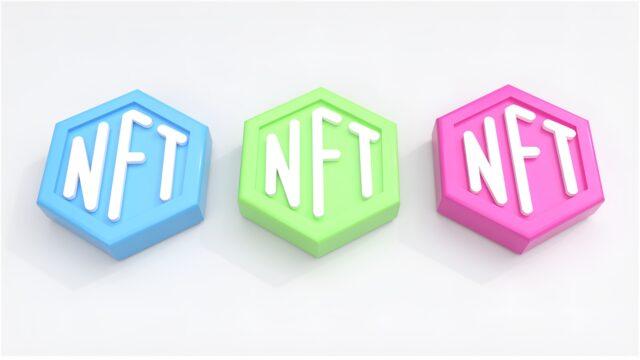 Photo by Deng Xiang three different colored blocks with the letters nft and nft on them